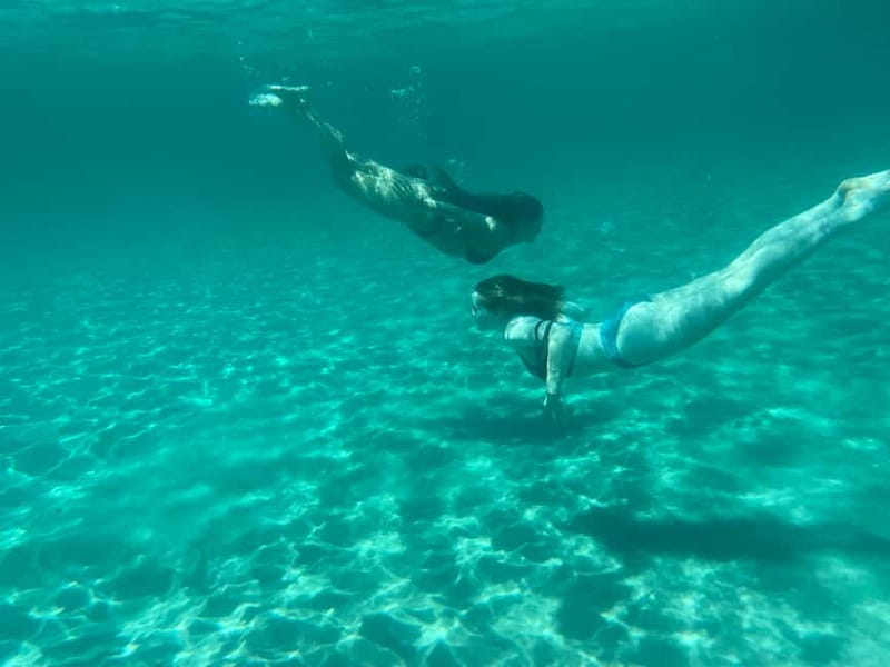 Cagliari: Boat Tour with 4 Swim Stops, Snorkeling & Prosecco - Sella del Diavolo and the final swim