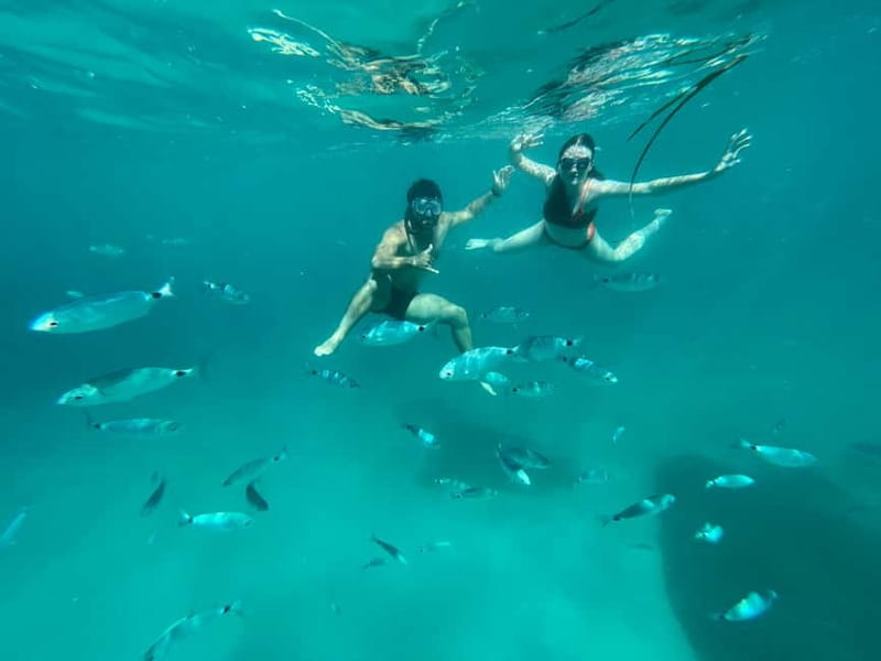 Cagliari: Boat Tour with 4 Swim Stops, Snorkeling & Prosecco - Leaving Via Roma for the Devil’s Saddle