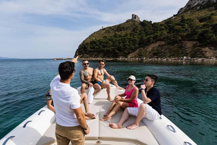 Cagliari: Boat Tour with 5 Snorkeling Stops & Free Drinks - Poetto: Cagliari’s famous beach from offshore