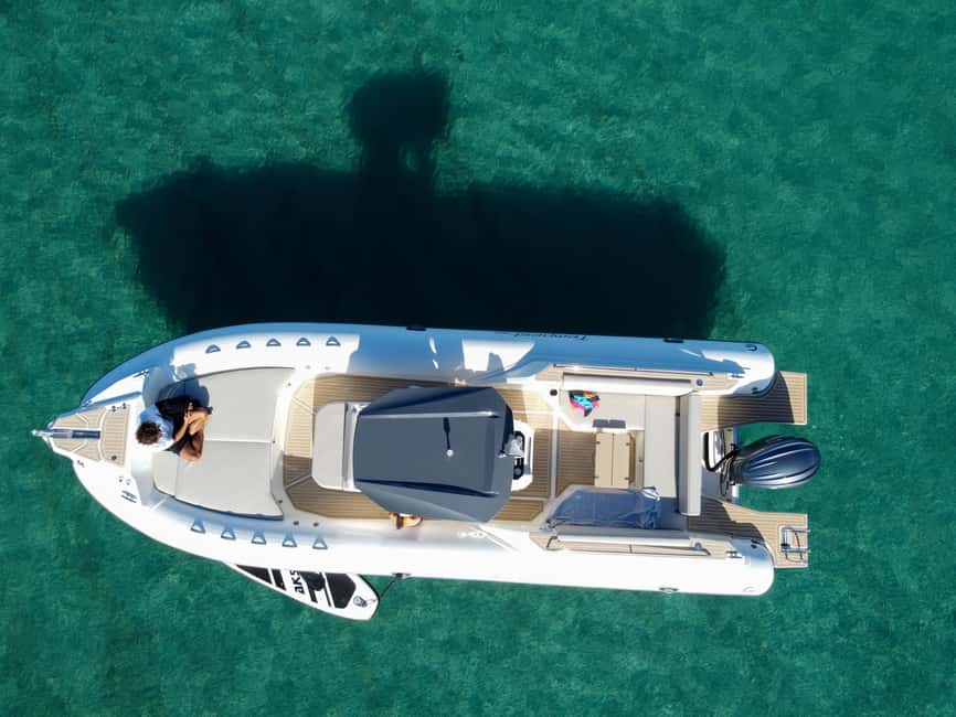 Cagliari: Boat Tour with 5 Snorkeling Stops & Free Drinks - Drinks, music, and the social side of the trip