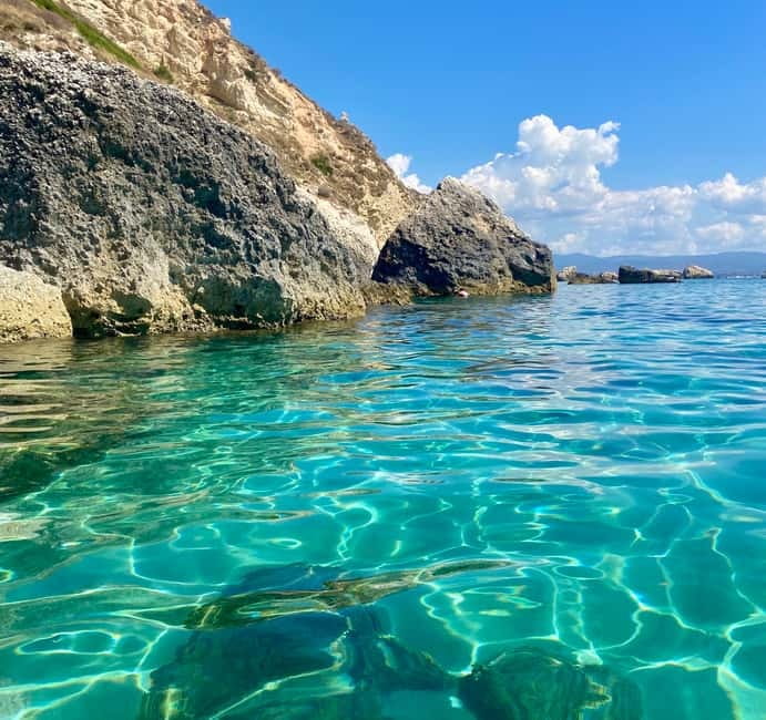 Cagliari: Boat Tour with Snorkeling, GoPro & Sardinian Beer - Cala Mosca: your first chance to swim