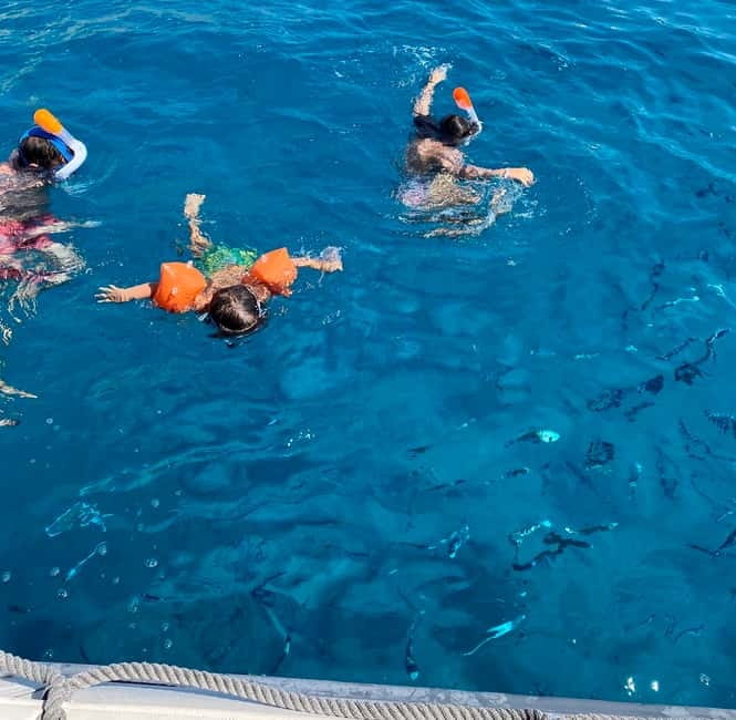 Cagliari: Boat Tour with Snorkeling, GoPro & Sardinian Beer - Poetto Beach, Cagliari’s broad seaside playground