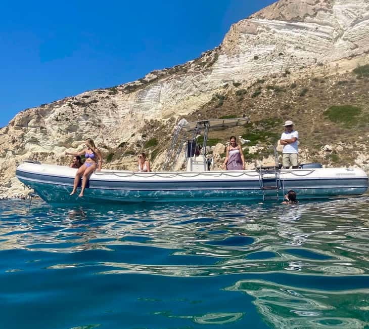 Cagliari: Boat Tour with Snorkeling, GoPro & Sardinian Beer - Leaving Cagliari Port for the open coast