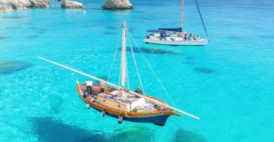 Cagliari: Boat Tour with Swim Stops, Snorkeling, & Aperitif - Cala Bernat: a gentle start in clear water