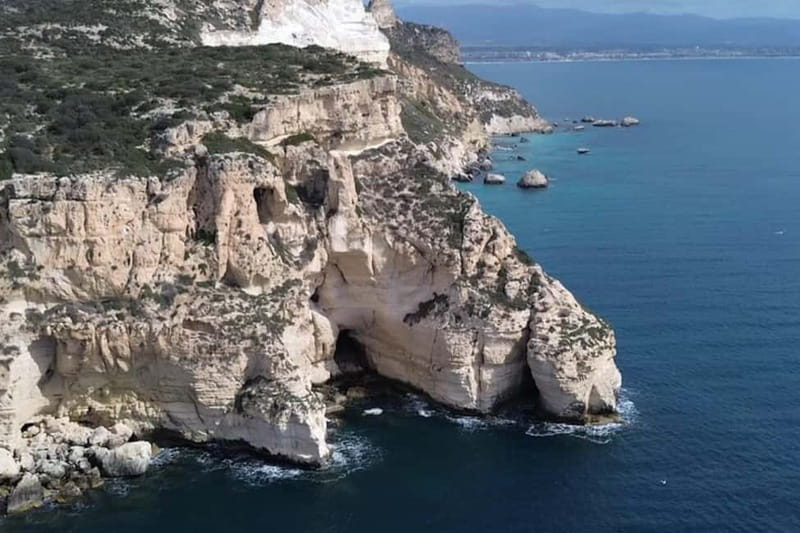 Cagliari: Catamaran Tour, Swimming, Snorkeling, & Prosecco - The return ride, music, and prosecco