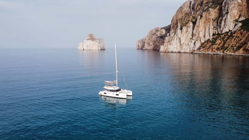 Cagliari: Catamaran Tour to the Gulf of the Angels - Cheese, salami, pane carasau, and an aperitif