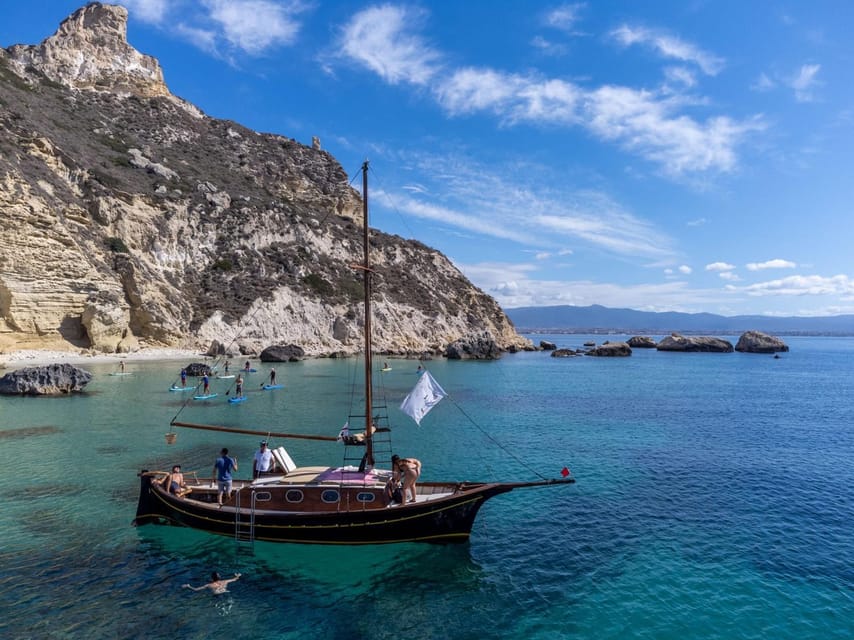 Cagliari: Classic Boat tour along the gulf with tasting. - Cala Fighera and Grotta dei Colombi