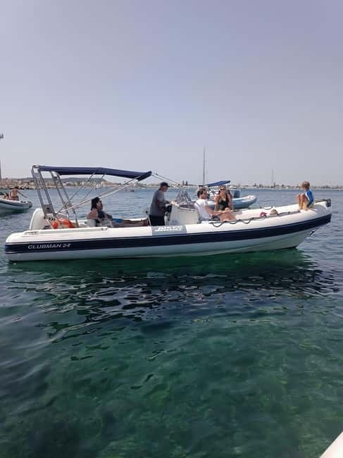 Cagliari: Devil's saddle boat tour, 4 stops and prosecco - Grotta dei Colombi is a scenic pass-by