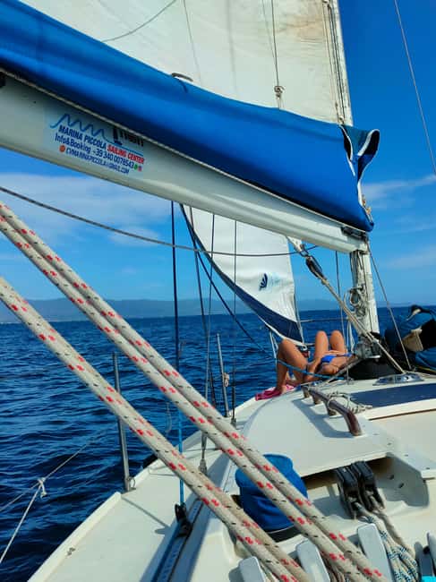 Cagliari Sailing Boat Tour with Snorkeling and Drink - Swimming in natural pools near the cape