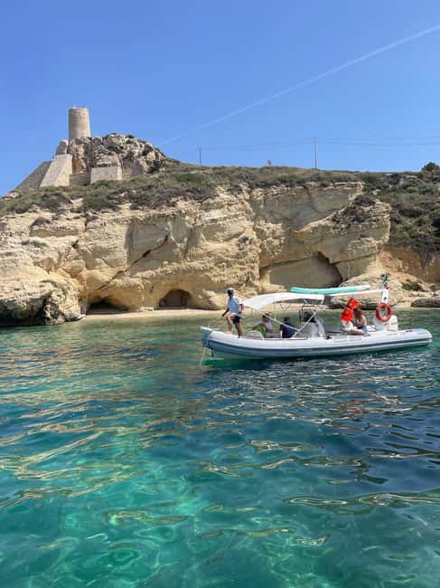 Cagliari: Sella del Diavolo Boat Magic Tour Drinks & Snacks - Meeting the boat near Pier F
