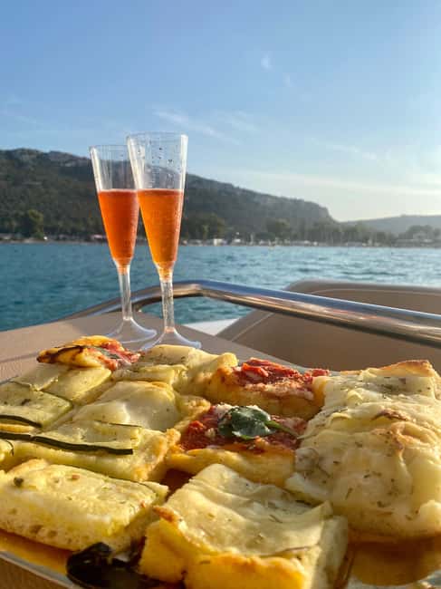 Cagliari: Sunset Boat Tour with Aperitif and Prosecco - Cala Mosca and the Long Sunset Stop