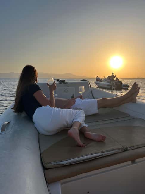Cagliari: Sunset Boat Tour with Aperitif and Prosecco - Music, Snacks, and the Social Side