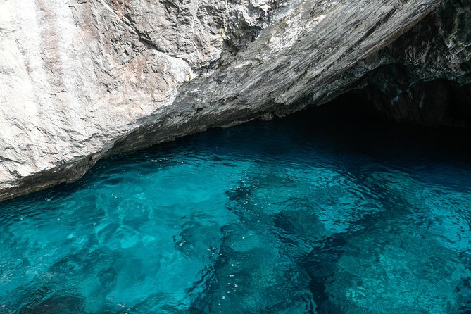 Capri Coast to Coast: Boat Tour with Optional Blue Grotto - Natural Arch and Villa Malaparte from the sea