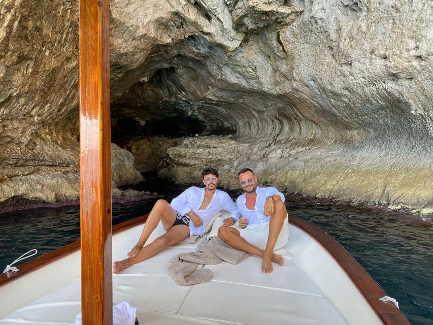Capri: Island and Grottos Boat Cruise with Snacks and Drinks - Natural Arch and Casa Malaparte from the sea