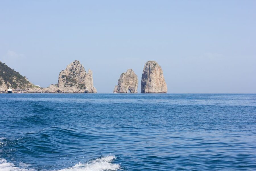 Capri: Private Island Boat Tour for Couples - Following Capri’s cliffs toward the Natural Arch