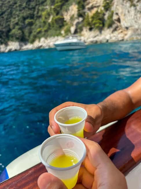 Capri: Scenic Boat Tour with Swimming, Limoncello & Snack - The Faraglioni: Capri’s signature photo stop