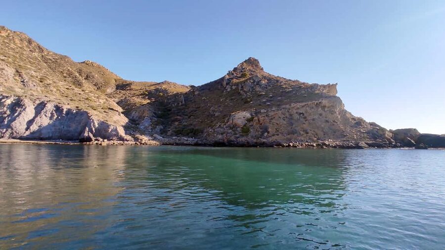 Cartagena: Guided boat tour to Isla de las Palomas - Leaving Cartagena’s harbor beside the whale tail