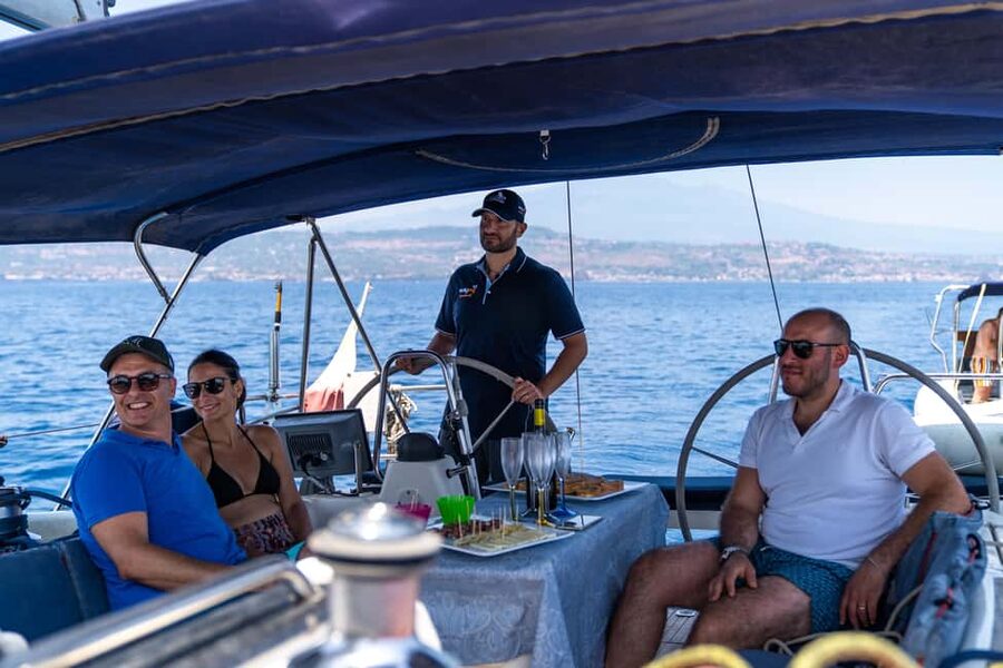 Catania: Cyclops Coast Cruise with Appetizer & Snorkeling - Lachea Island: swimming, snorkeling, and SUP time