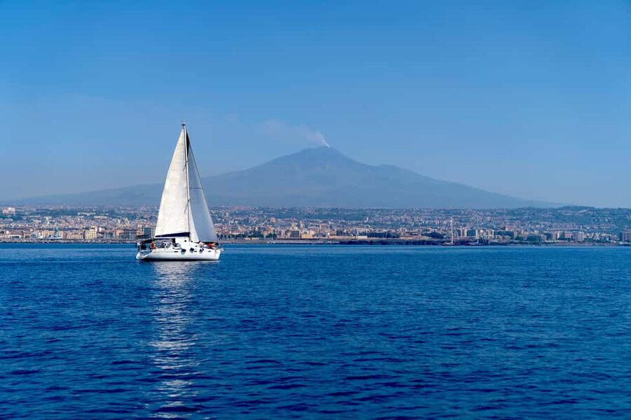 Catania: Cyclops Coast Cruise with Appetizer & Snorkeling - Leaving Club Nautico and following the black lava coast