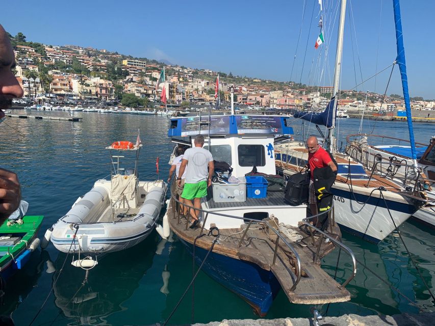 Catania: Cyclops Islands & Timpa Nature Reserve Boat Tour - The crew and the value of the guide
