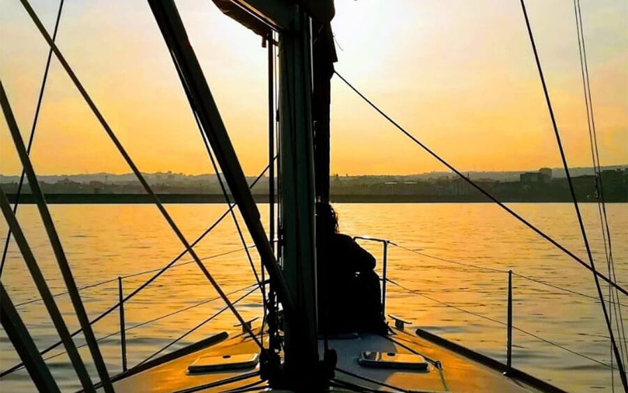 Catania: Guided Sunset Sailing Trip with Aperitif & Prosecco - Reaching the Caves of Ulysses