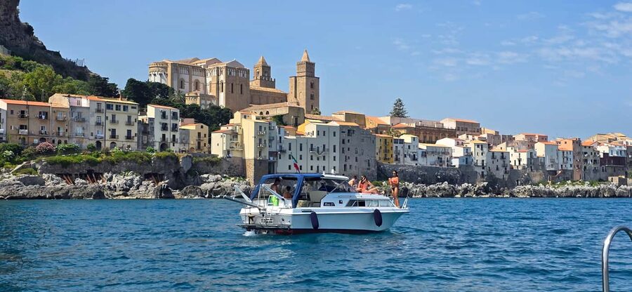 Cefalù: Coast-to-coast boat day trip with snorkeling and aperitif - Meeting at Cefalù’s port