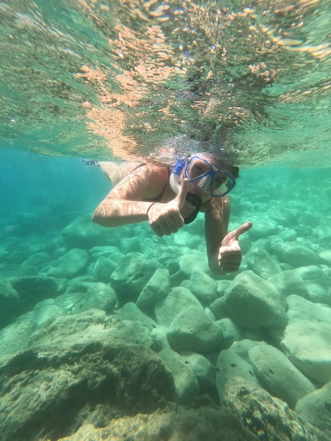 Chania: Boat Trip with Guided Snorkeling Tour - The break: fruit, water, and a chance to warm up