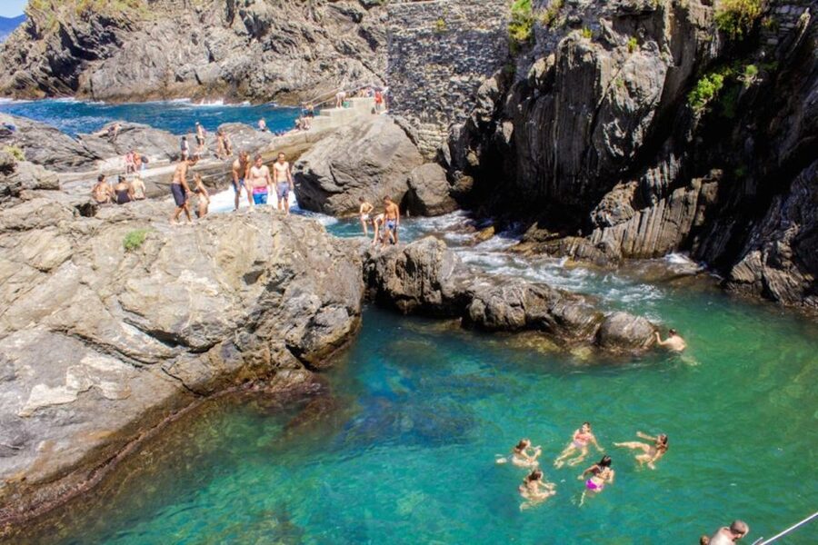 Cinque Terre: Hybrid Boat Tour with Swimming Stop - Riomaggiore and the return to Monterosso