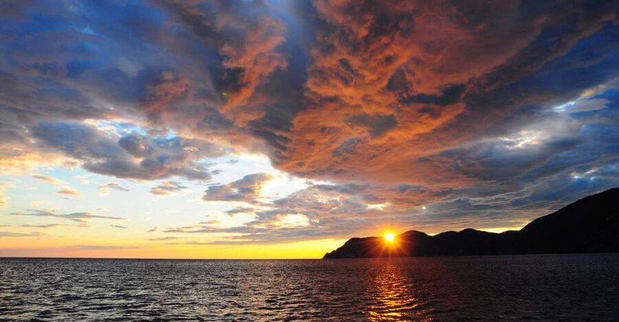 Cinque Terre: Sunset Cruise with Aperitif on Board - Monterosso to Corniglia: beaches, cliffs, and open views