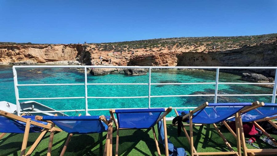 Comino: Blue Lagoon & Caves Boat Cruise - Burgers, pineapple cocktails, and reasonable onboard prices