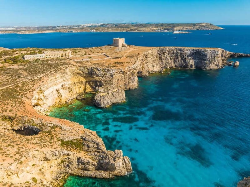Comino: Blue Lagoon, Crystal Lagoon and Sea Caves Boat Tour - Caves and Elephant Rock from the water