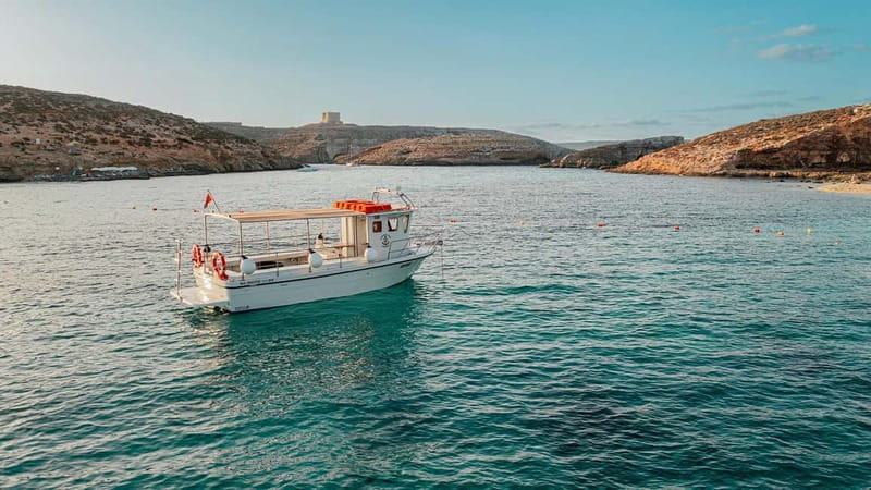 Comino: Blue Lagoon, Crystal Lagoon and Sea Caves Boat Tour - Finding the boat at Cirkewwa