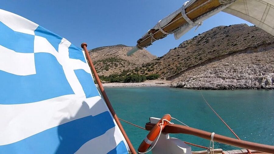 Corfu: Sunset Cruise on a Traditional Wooden Sailing Yacht - Drinks, snacks, and music on board