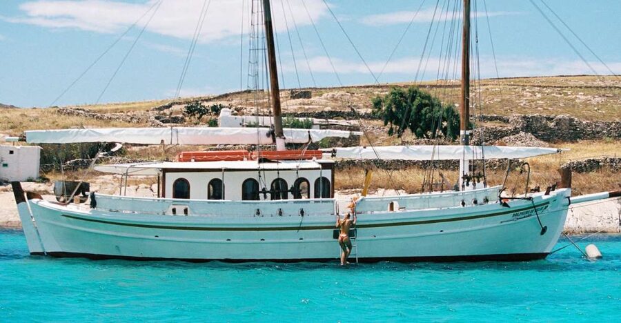 Corfu Town: Full-Day Cruise with Lunch, Drinks & Swim Stops - Leaving Corfu’s old port aboard Koryfo