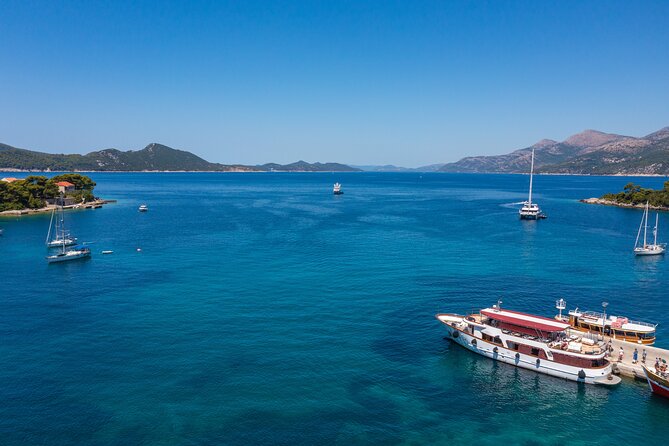 Dubrovnik: Elaphiti Islands Full-Day Cruise with Lunch - Koločep: pine woods, clear water, and a short first stop
