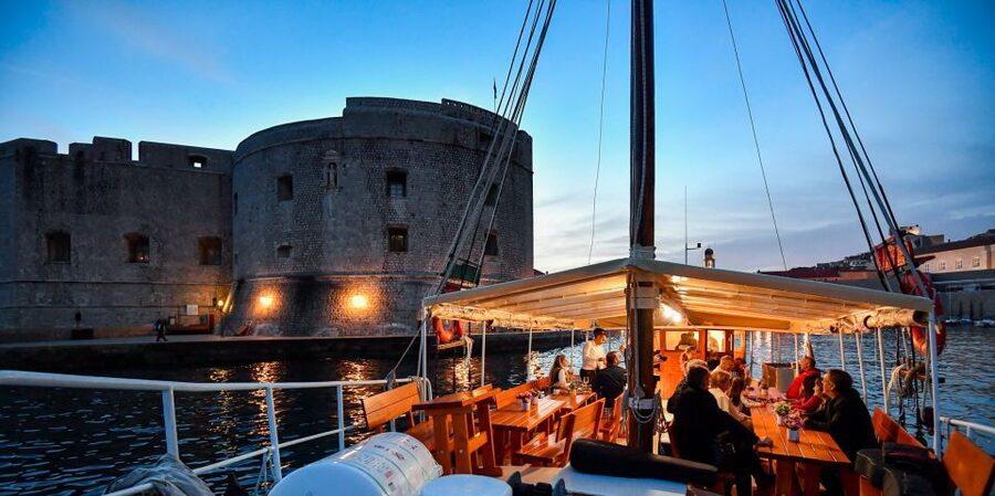 Dubrovnik: Panoramic Sunset Cocktail Cruise Around Old Town - Finding Slavija at Dubrovnik’s Old Port