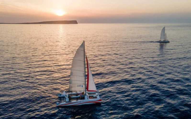 Fornells: Catamaran Sunset Cruise of Menorca's Coast - Leaving Fornells as the light softens