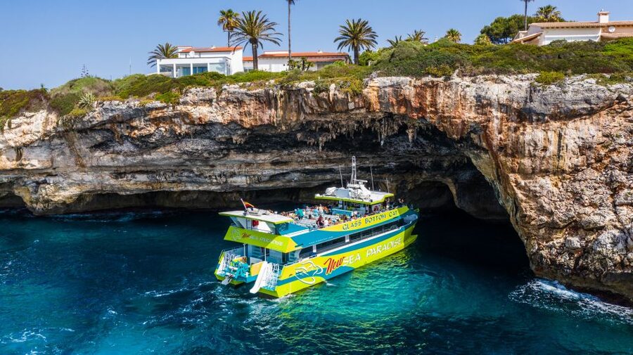 From Cala Millor: East Coast Glass-Bottom Boat Trip - Meeting point and access details