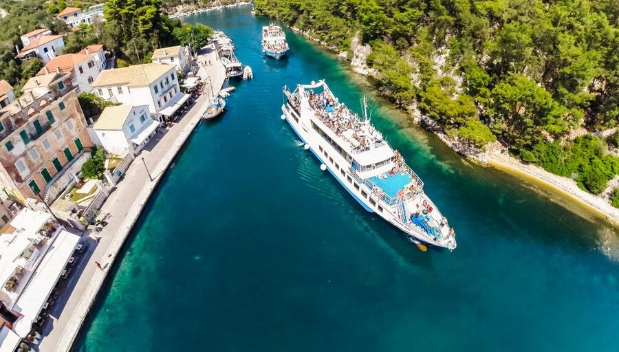 From Corfu: Day Cruise to Paxos, Antipaxos, and Blue Caves - Guides, music, and the mood on board