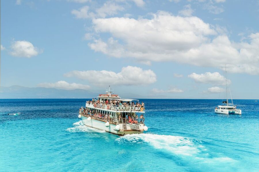 From Corfu Island: Antipaxos & Paxos Blue Caves Boat Cruise - Entering the Blue Caves of Paxos