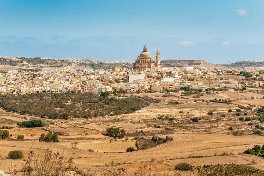 From Malta: Gozo Quad Bike Tour & Comino Boat Tour w/ Lunch - The first stops: Rotunda Church and Sanap Cliffs