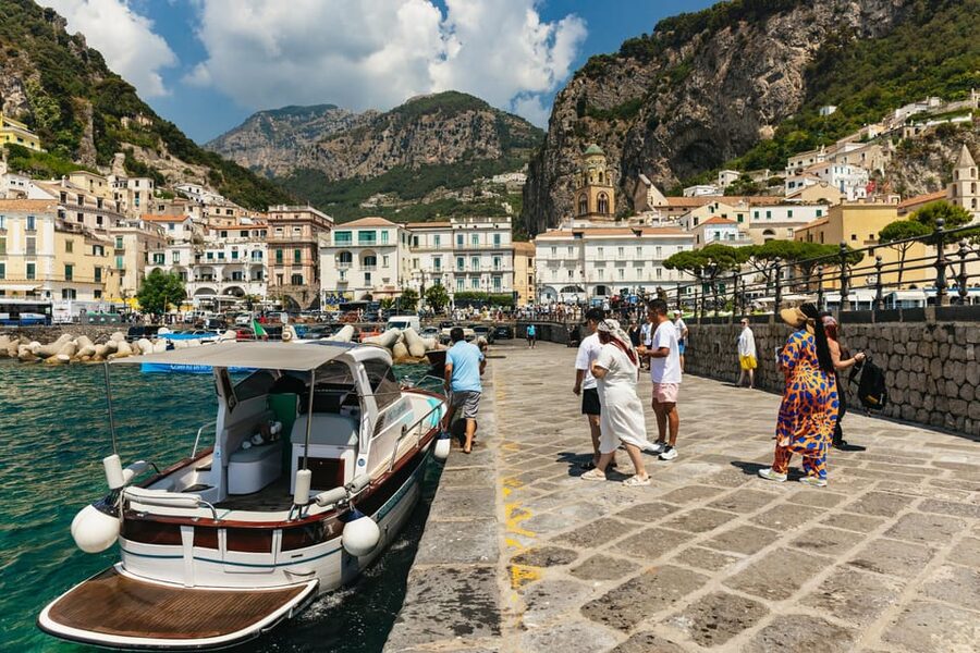 From Naples: Positano and Amalfi Boat Tour with Drinks - Sailing past Marina Grande and Bagni della Regina Giovanna
