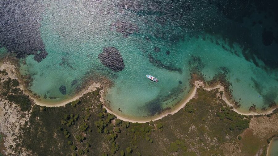 From Ouranoupoli: Blue Lagoon Two Island Cruise - Banana Beach: lunch, shade, and a calmer finish