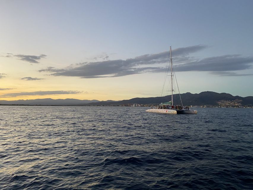 From Roses: Sunset Catamaran Cruise - Sailing out across the Bay of Roses