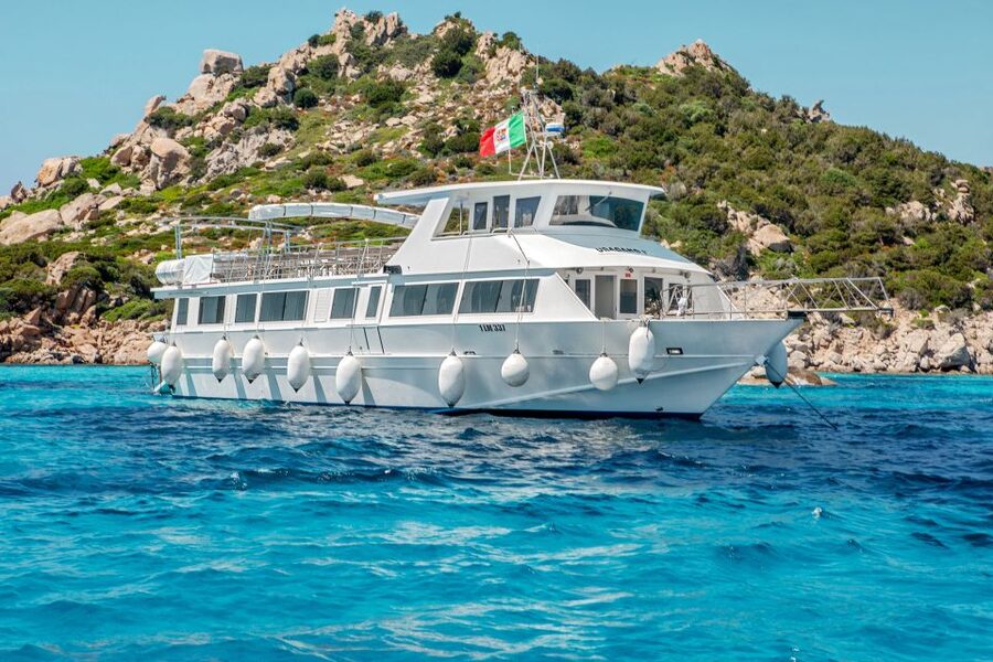 From Santa Teresa Gallura: La Maddalena Full-Day Boat Tour - Arriving at the port and boarding