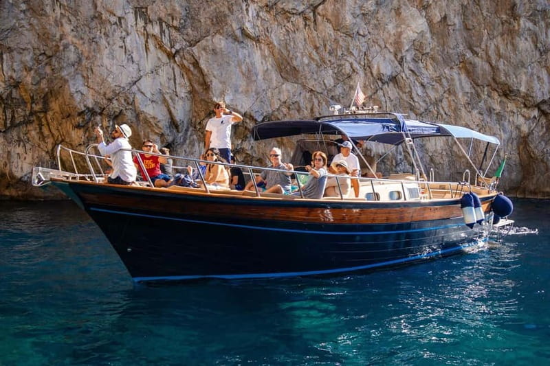 From Sorrento: Capri Boat Tour with Blue Grotto Visit - Returning to the boat for drinks and a second swim