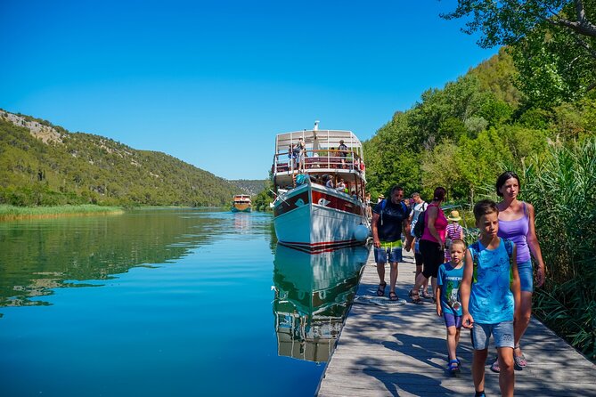 From Split: Krka Waterfalls Trip with Boat Cruise and Swimming - Primošten: swimming, lunch, and a coastal pause