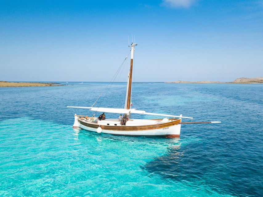 From Stintino: Asinara Vintage Sailing Boat Tour with Lunch - Cala Reale and the white donkeys