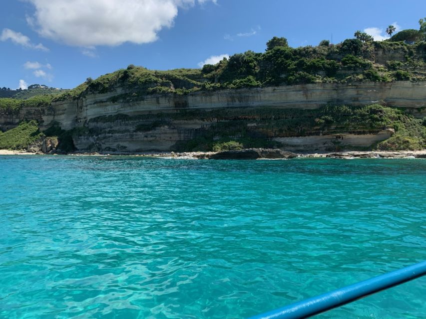 From Tropea: Capo Vaticano boat tour with snorkel & aperitif - Caves, rocks, and old harbor stories