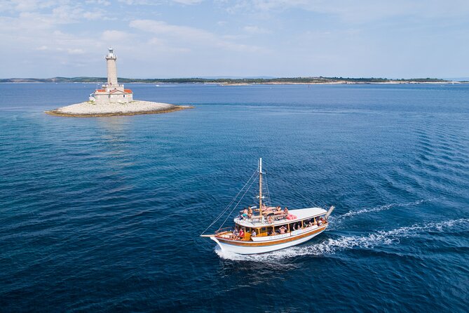 Full-Day Boat Tour of the Medulin Archipelago from Medulin - Porer Lighthouse, photographed from the Adriatic